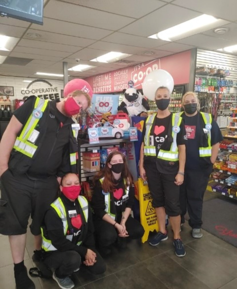 Co-op staff pose for a photo