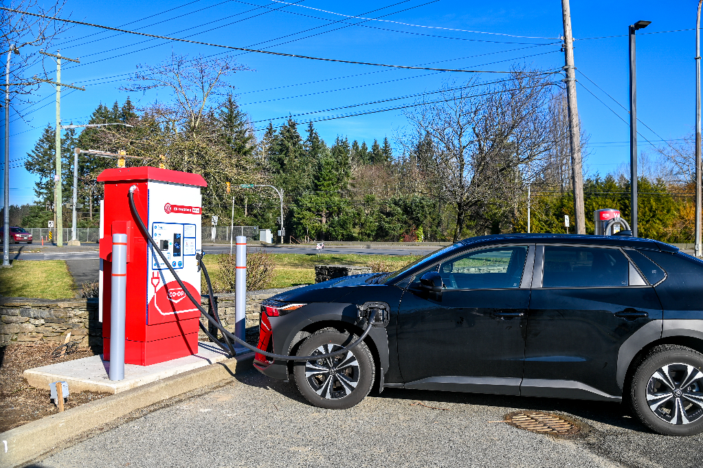 A vehicle charging at a Co-op EV charging station