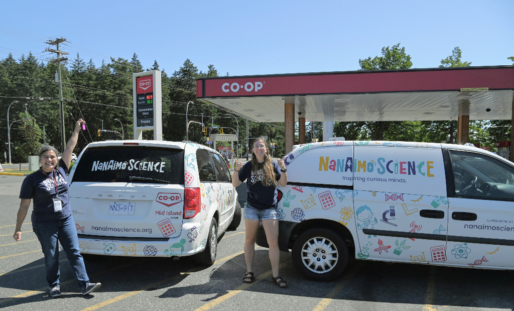 Nanaimo Science Executive Director Elaine Parker, and Outreach Coordinator Maddy Hart with the new Science on the Move vehicles at Mid Island Co-Op on Bowen Road in Nanaimo.